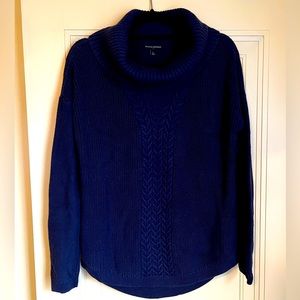 Banana Republic navy turtleneck sweater with cableknit design.